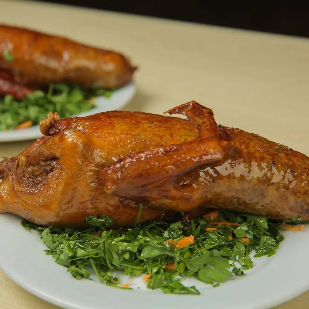 Stuffed pigeon with freekeh and soup